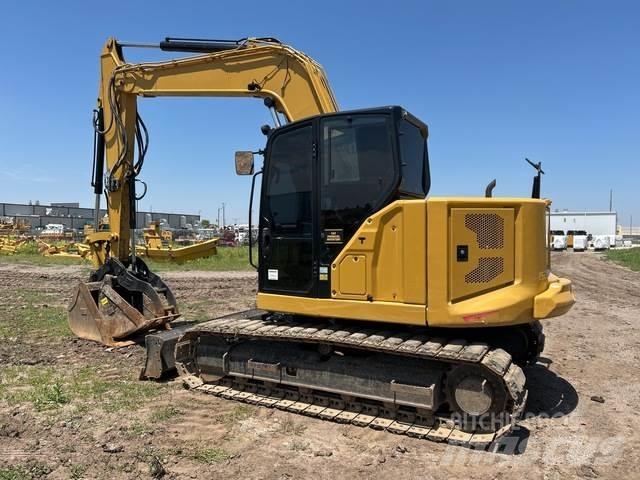 CAT 310 Rupsgraafmachines