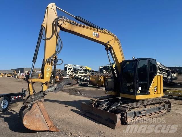 CAT 310 Rupsgraafmachines