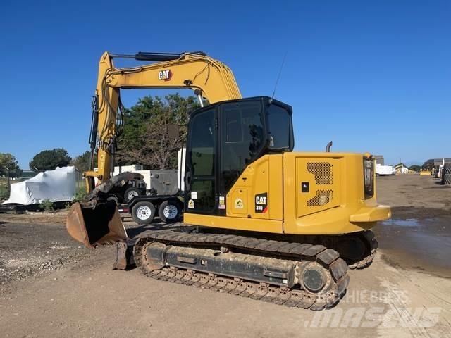 CAT 310 Rupsgraafmachines
