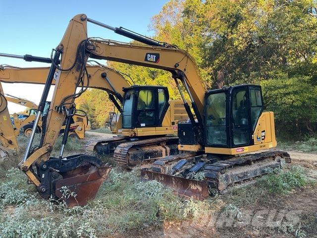CAT 310 Rupsgraafmachines