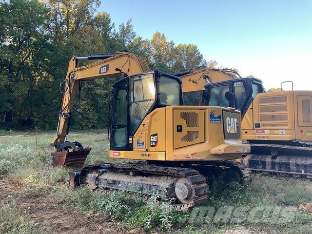 CAT 310 Rupsgraafmachines