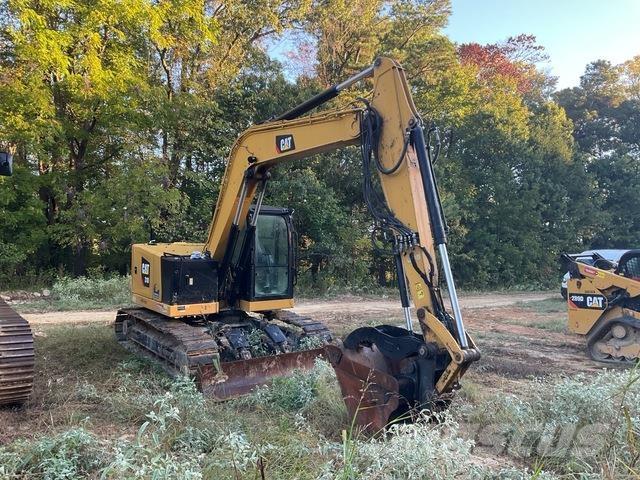 CAT 310 Rupsgraafmachines