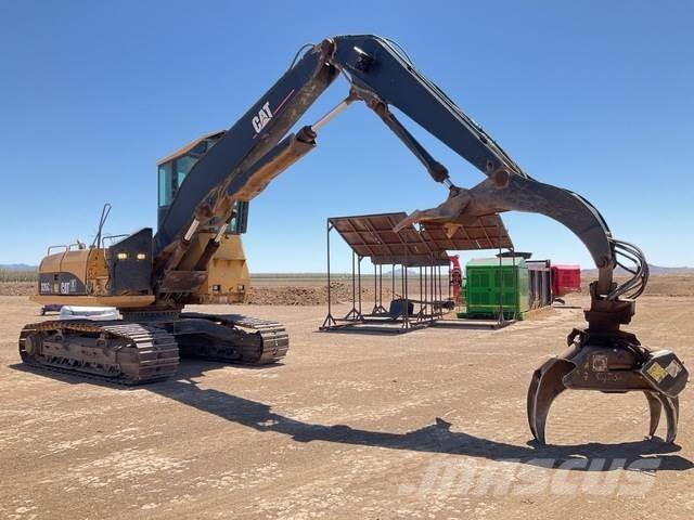CAT 320C Boomstamladers