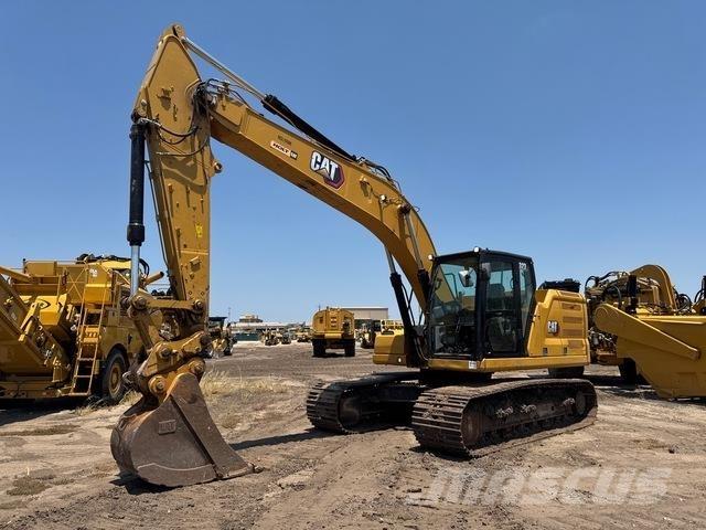 CAT 323 Rupsgraafmachines