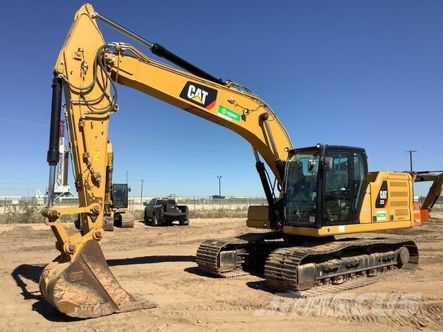 CAT 323 Rupsgraafmachines