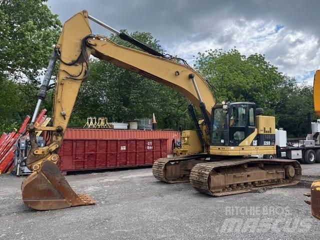 CAT 328 Rupsgraafmachines
