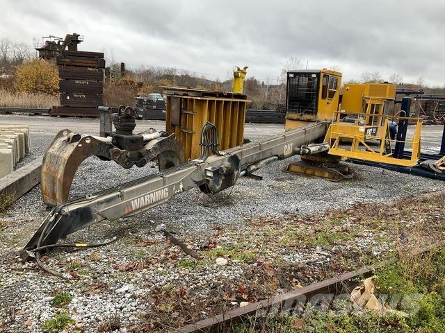 CAT 519 SM Boomstamladers