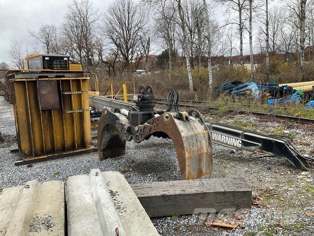 CAT 519 SM Boomstamladers