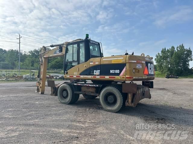 CAT M318D Wielgraafmachines