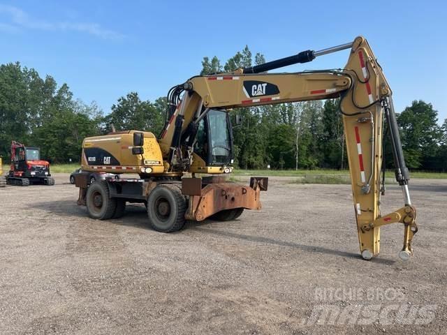 CAT M318D Wielgraafmachines