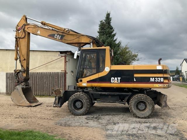 CAT M320 Wielgraafmachines