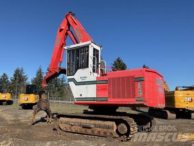 Madill 3800C Boomstamladers