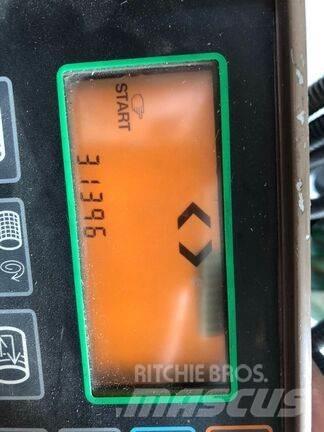 John Deere 590 Ronde-balenpersen