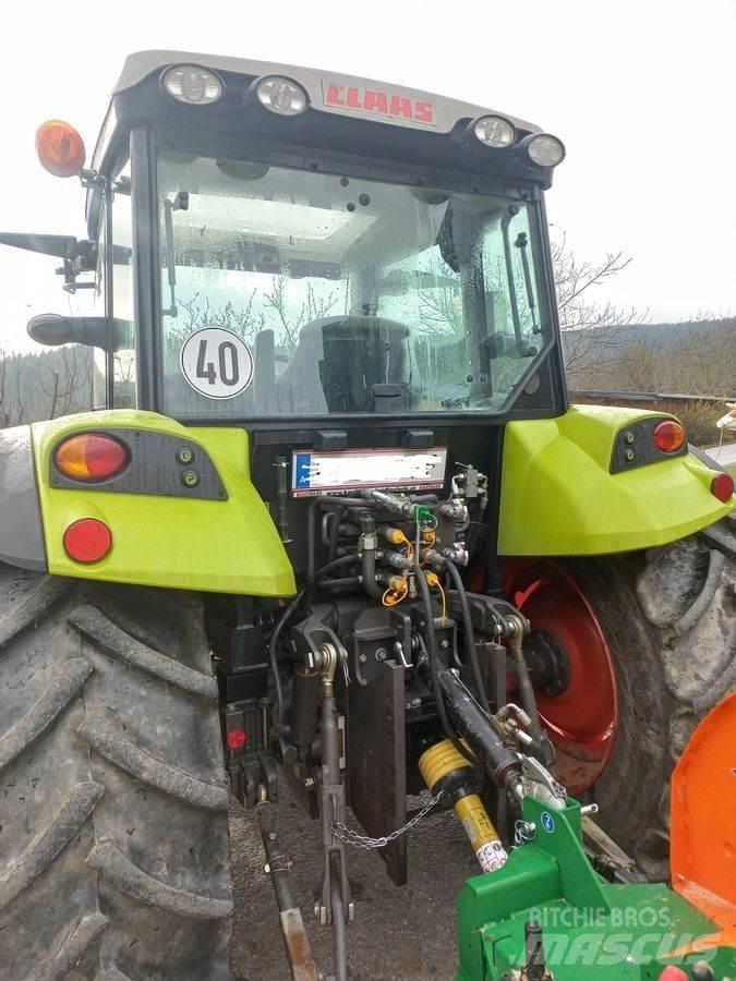 CLAAS Axos 330 CX Tractoren