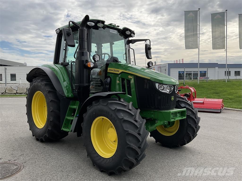 John Deere 6M 95 Tractoren