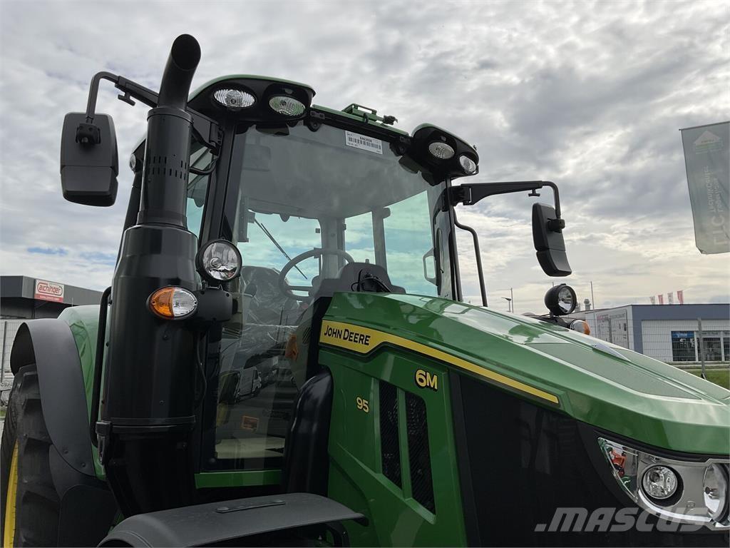 John Deere 6M 95 Tractoren