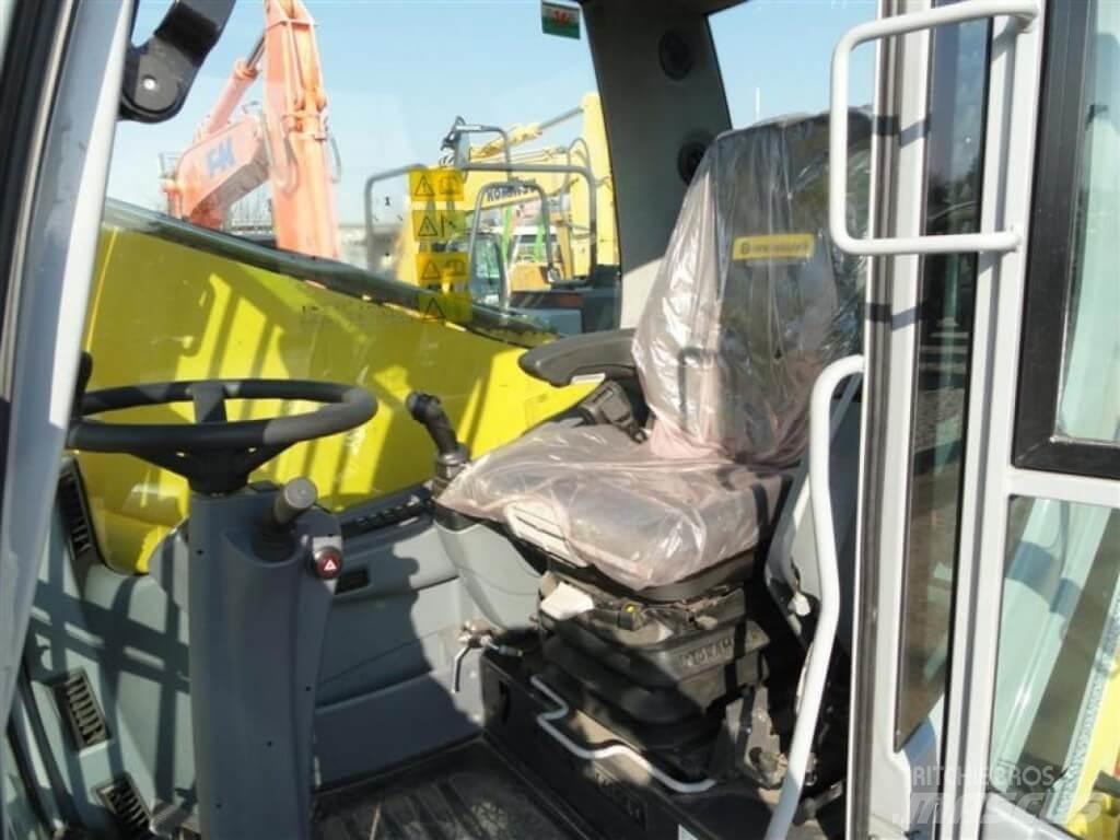 New Holland WE210 Wielgraafmachines