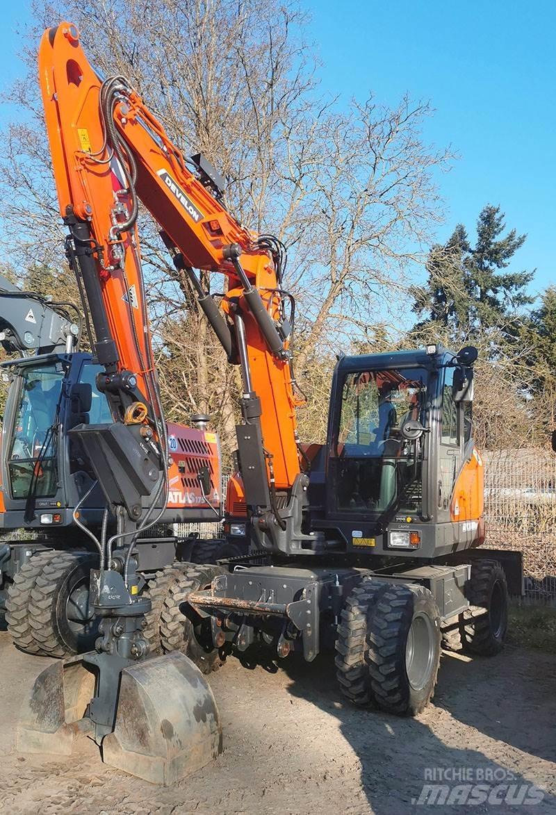 Develon DX 100 W-7 Wielgraafmachines