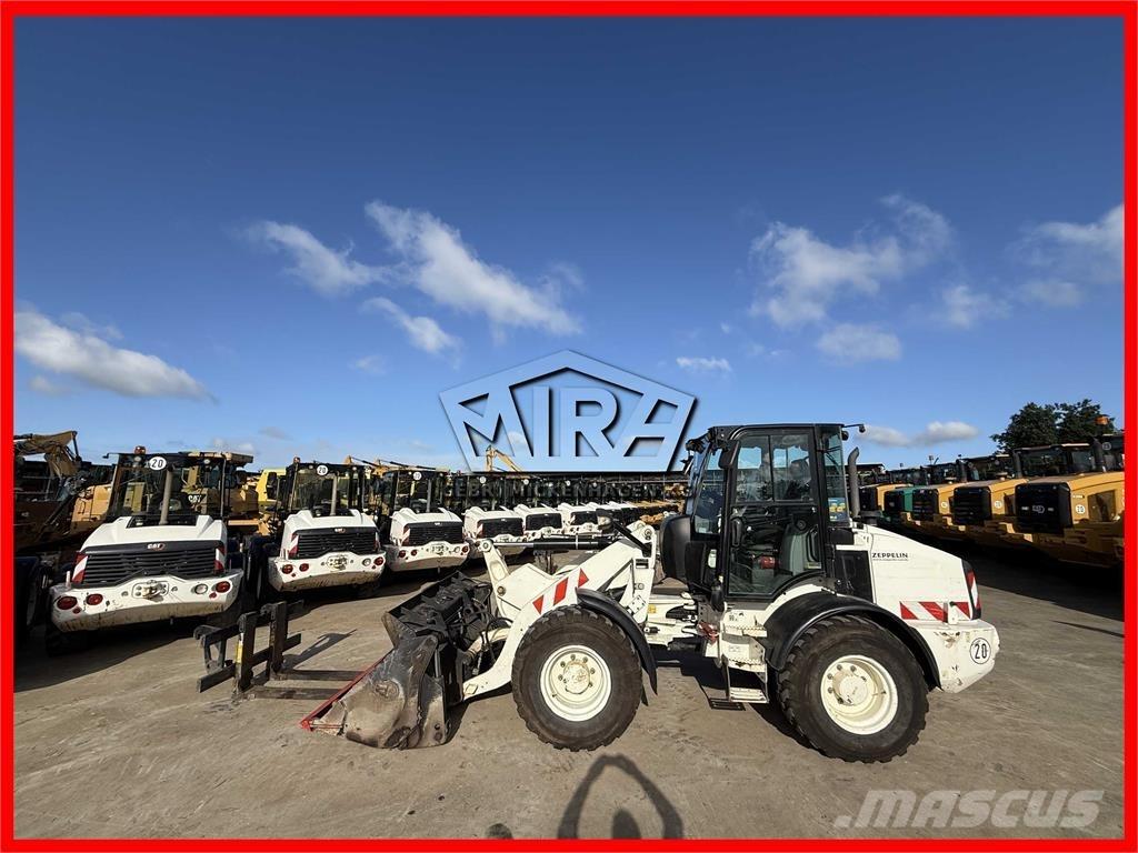 CAT 908M Wielladers