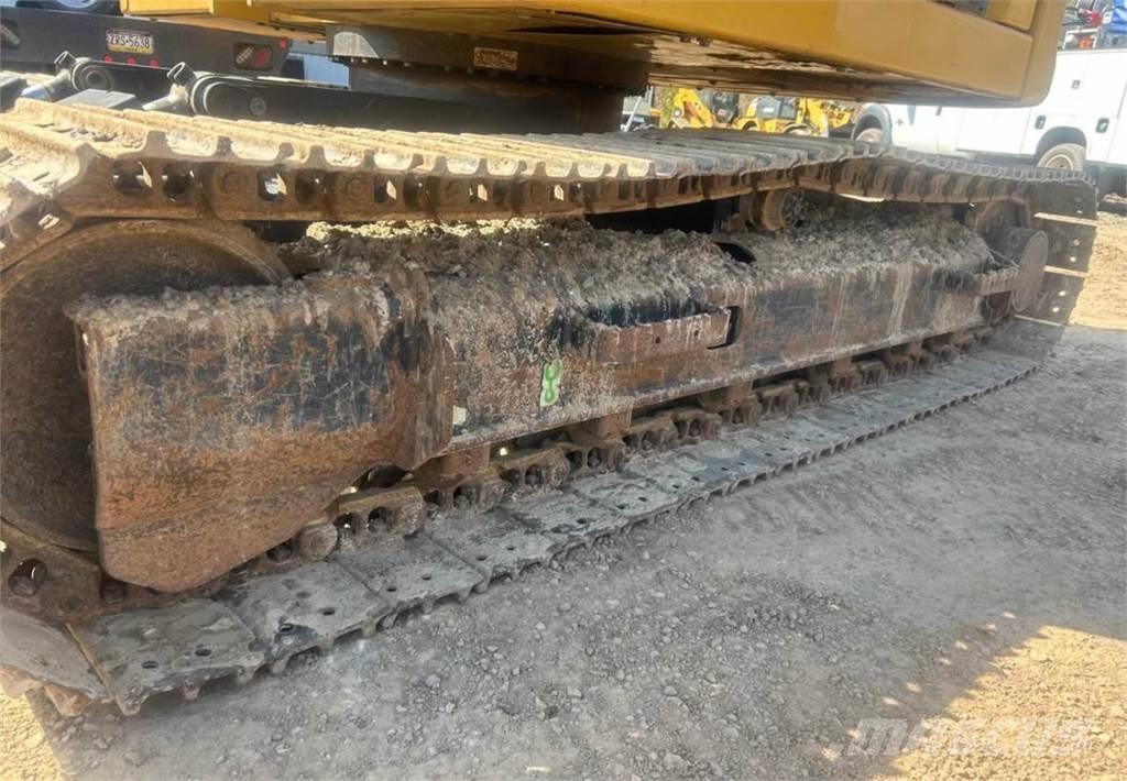 CAT 310 Rupsgraafmachines