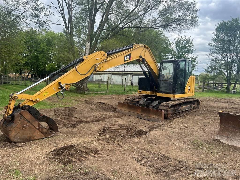 CAT 310 Rupsgraafmachines