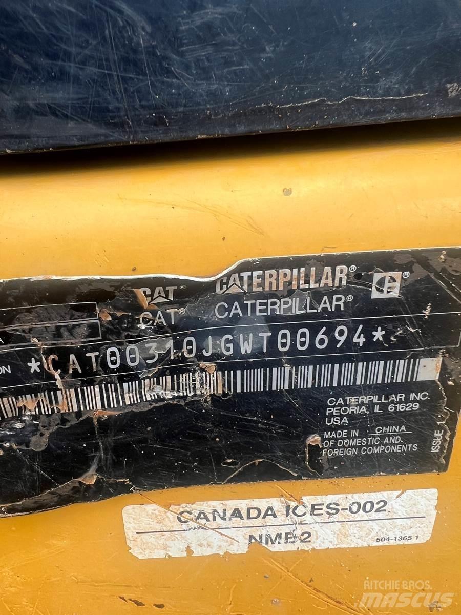 CAT 310 Rupsgraafmachines