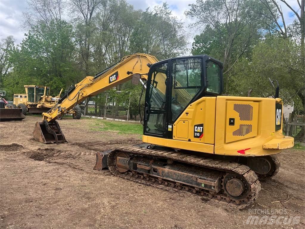 CAT 310 Rupsgraafmachines