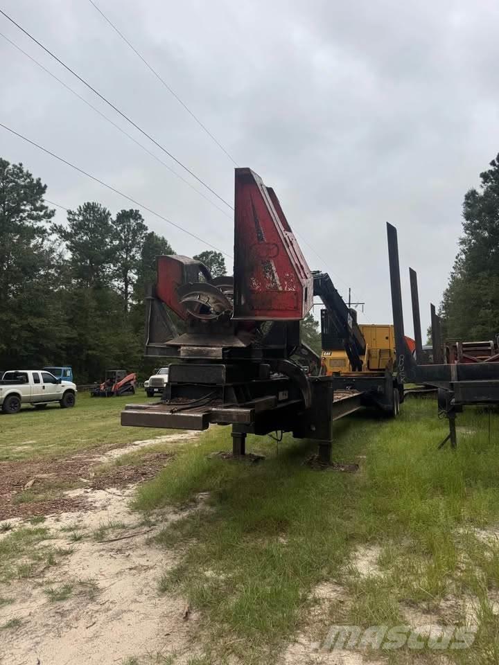CAT 559C Boomstamladers