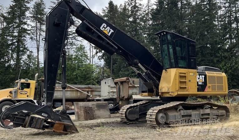 CAT 568 LL Boomstamladers