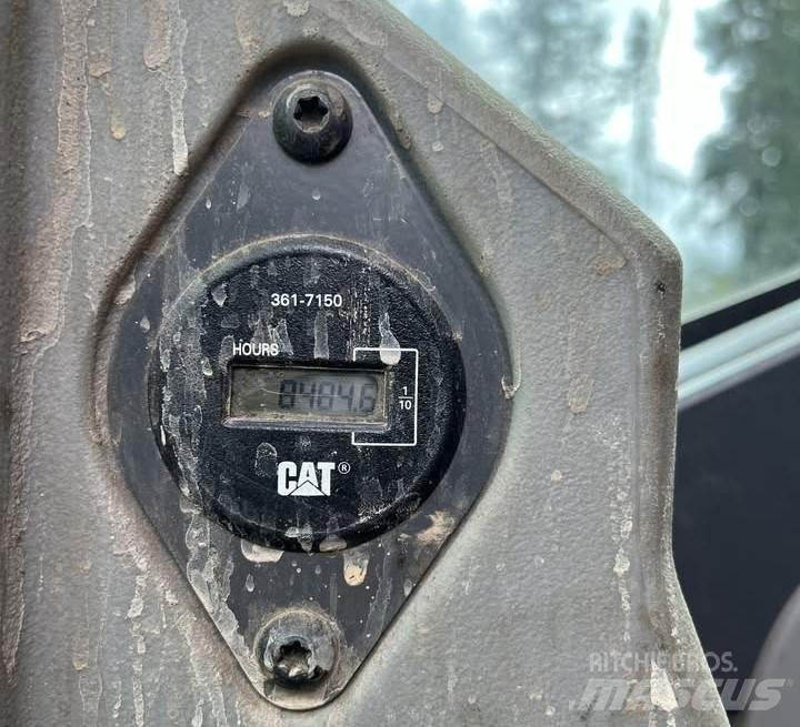 CAT 568 LL Boomstamladers