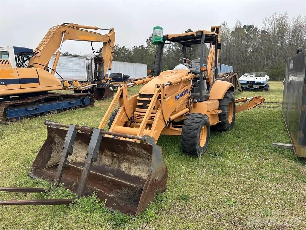 Komatsu WB140 Graaf-laadcombinaties