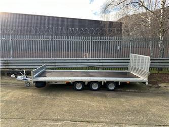 Indespension U-TILT tri-axle flat trailer