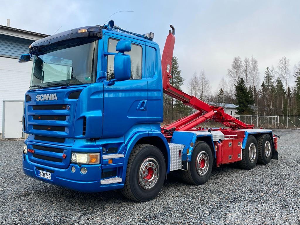 Scania R500 8x4 teliveto, koukkulaite Vrachtwagen met containersysteem