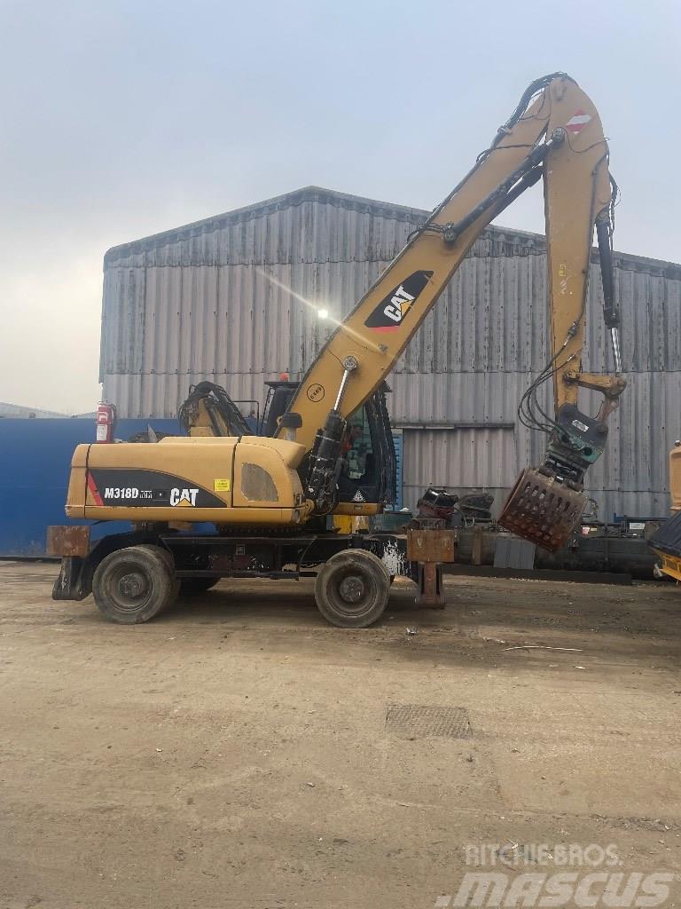 CAT 318 dmh Anders