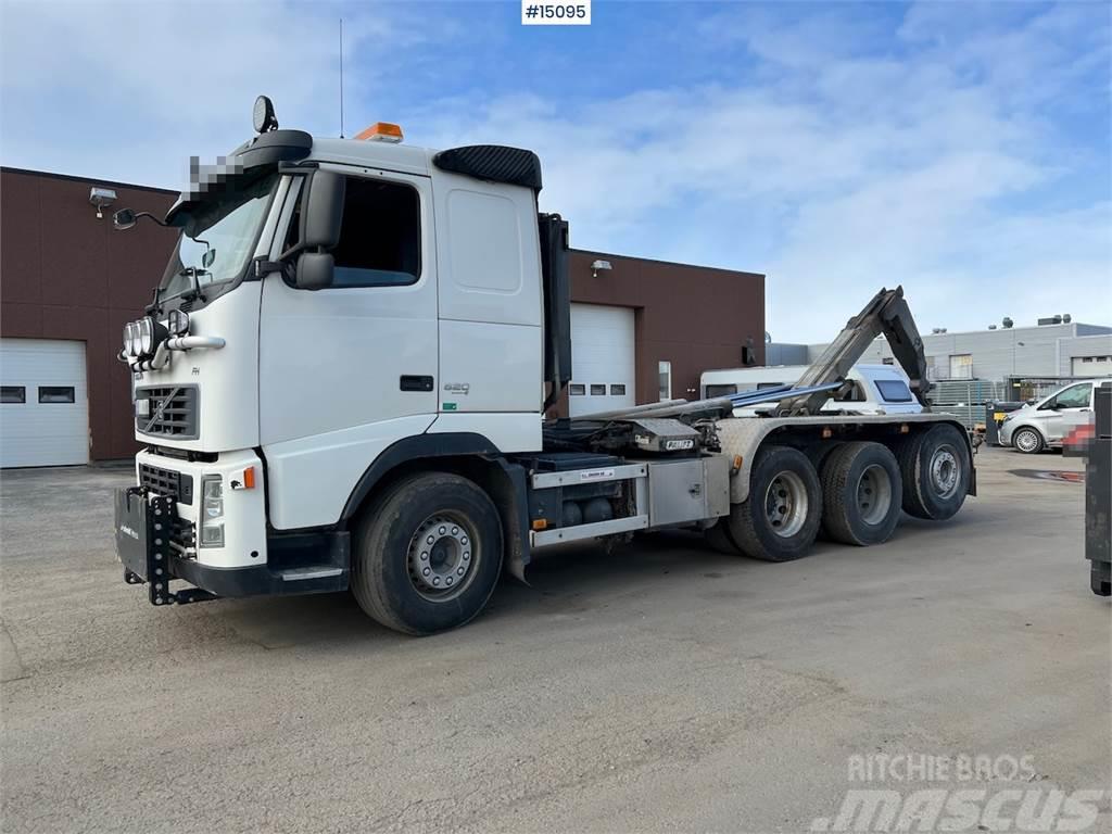 Volvo FH 520 8x4 tridem hook truck w/ plow rig Vrachtwagen met containersysteem