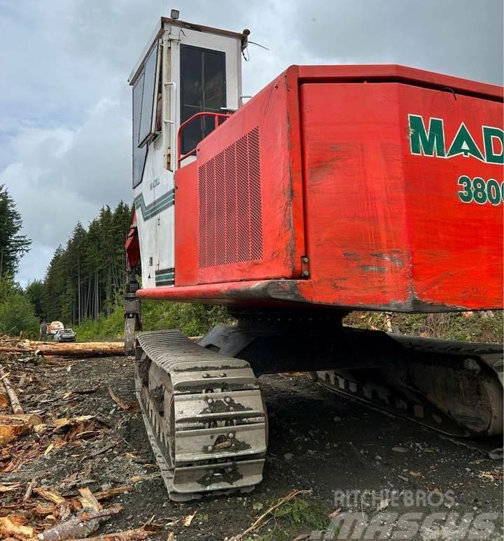 Madill 3800C Boomstamladers