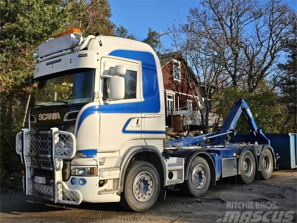 Scania R560 8x4 koukku Vrachtwagen met containersysteem