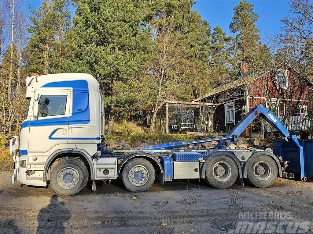 Scania R560 8x4 koukku Vrachtwagen met containersysteem